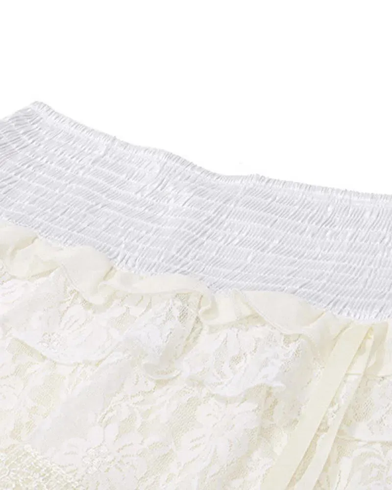 Orietta – Adjustable side drawstrings – Ruffled mini skirt