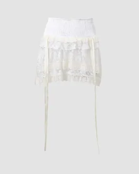 Orietta – Adjustable side drawstrings – Ruffled mini skirt