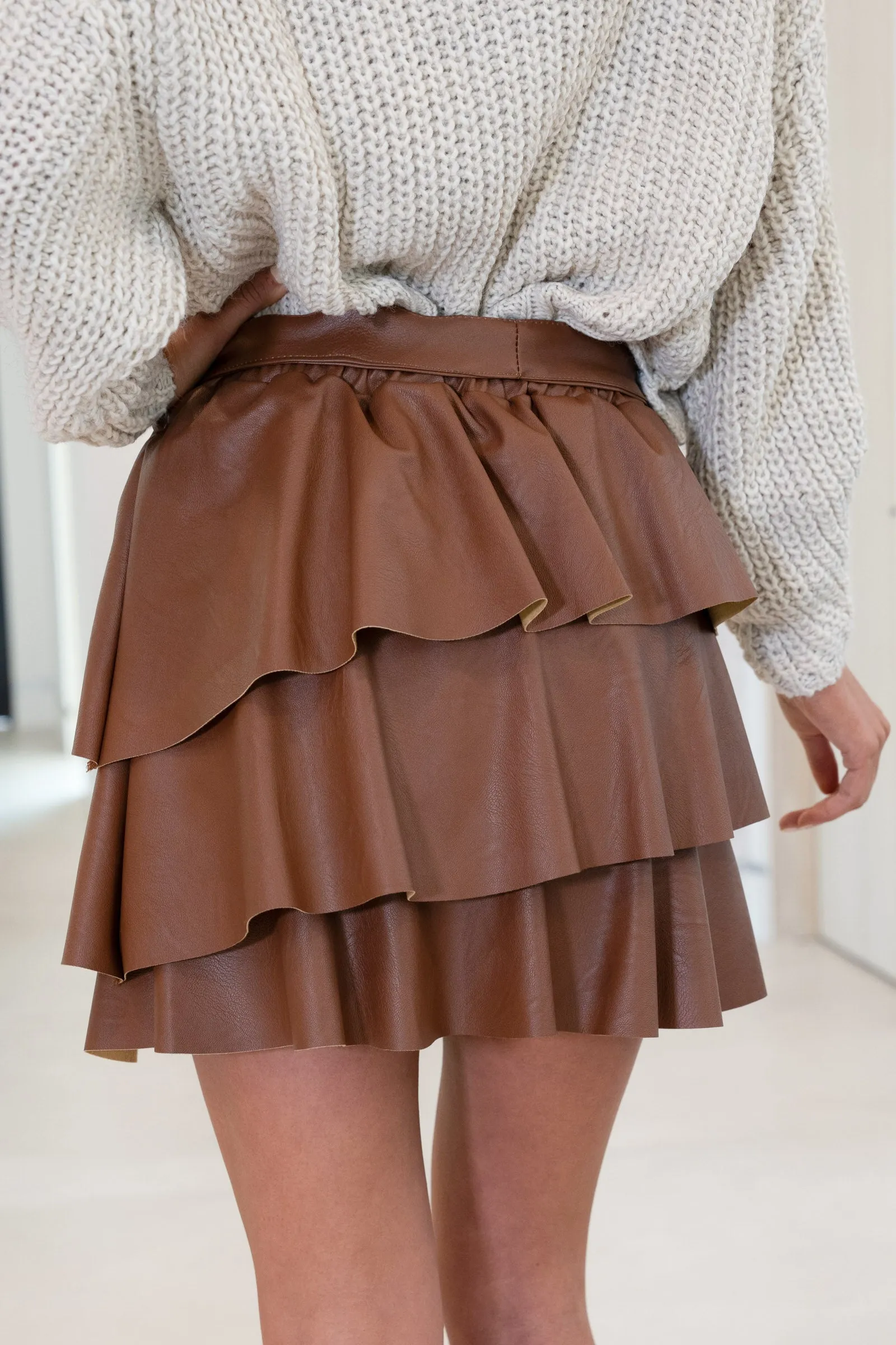 The Faux Leather Tiered Mini Skirt