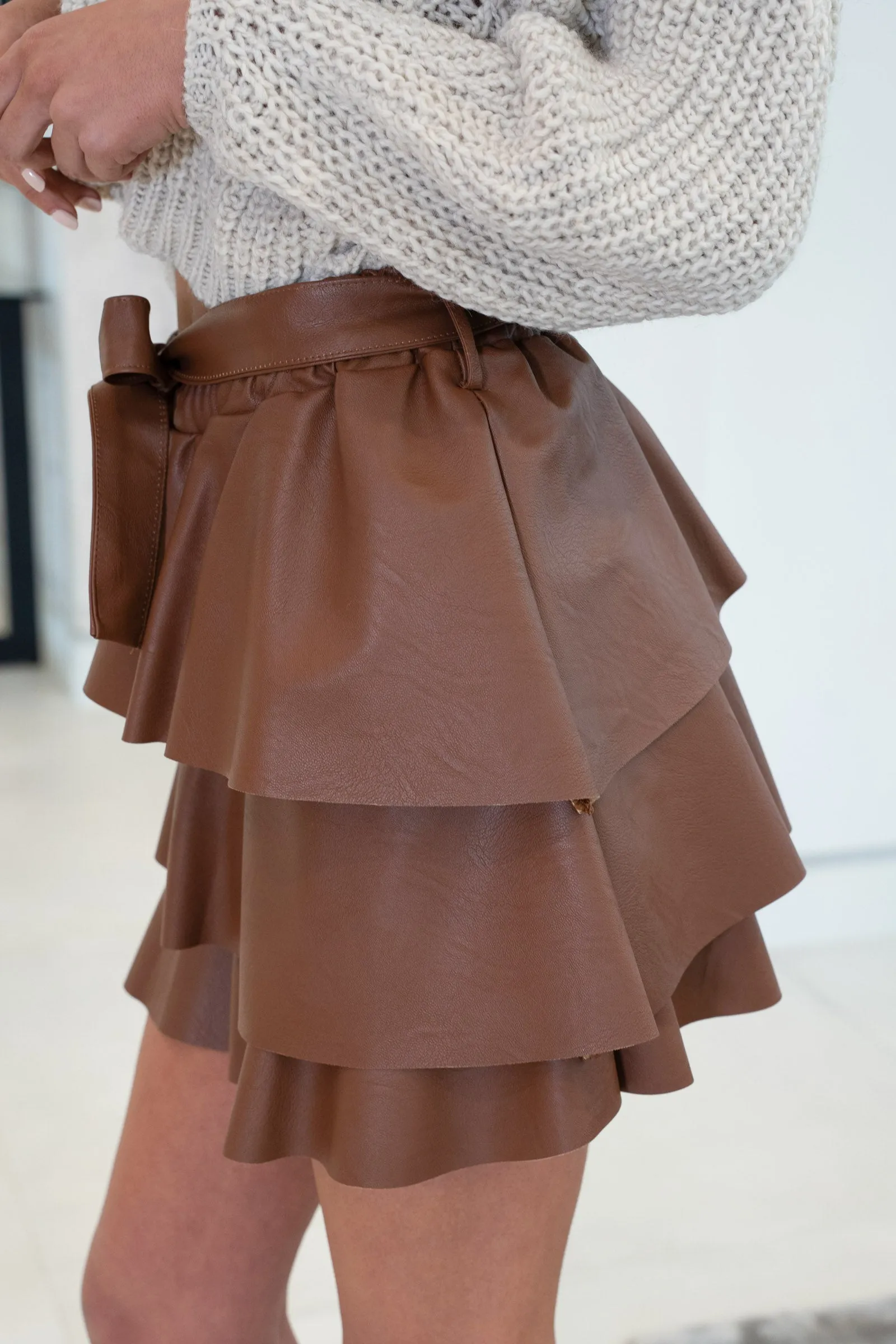 The Faux Leather Tiered Mini Skirt